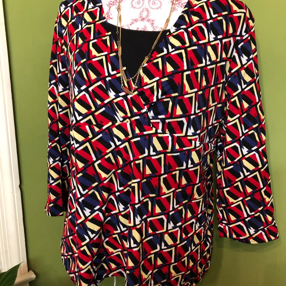 Bright, happy, multi-colored blouse.